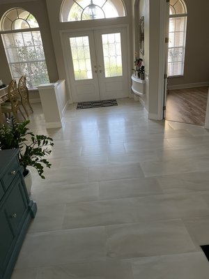 12x24 porcelain tile from Floor and Decor. We provided installation. - This is a project we provided installation only. Customer purchased the porcelain tile from Floor and Decor.  The project involved removing the existing tile and install the new.