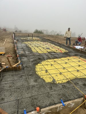 ADU Footing / Pad Pour / hillside water diversion - This ADU project started with multiple jobs to complete. The start from excavating footing, setting forms, laying specified materials and vapor barriers prior to rebar and multiple inspections. Finally a smooth hard trowel finish. Additional work included water diversion creating a riprap pit for storm rain along hillside. ADU Footing / Pad Pour / hillside water diversion - This ADU project started with multiple jobs to complete. The start from excavating footing, setting forms, laying specified materials and vapor barriers prior to rebar and multiple inspections. Finally a smooth hard trowel finish. Additional work included water diversion creating a riprap pit for storm rain along hillside.