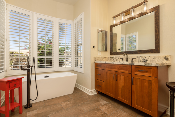 Bathroom remodel 2022 - This was a super fun project, that entailed a full scale master bathroom remodel. It required us to remove everything down to the concrete and to the studs. We provided all design, material, labor, electrical, plumbing, tile work, custom cabinets, and shutters. The homeowner wanted to bring "Montana" into their living space.