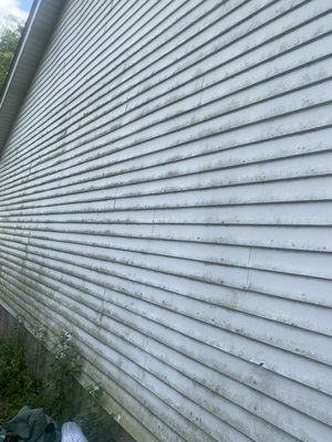 Exterior house wash - This house was super dirty but we hit it with some industrial cleaning product and a soft wash.