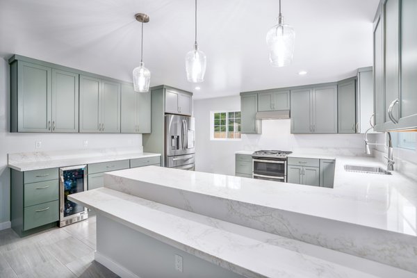 San Diego Kitchen Remodel - This stunning kitchen remodel features soft sage cabinetry, sleek stainless steel appliances, quartz countertops, and a spacious open layout perfect for cooking and entertaining.
At TR Construction, we handle every detail—from custom-built cabinetry to expert tile work, plumbing, lighting, and finishing touches. Whether you come to us with a complete design or just a dream, our in-house team of craftsmen and designers will make it a reality. San Diego Kitchen Remodel - This stunning kitchen remodel features soft sage cabinetry, sleek stainless steel appliances, quartz countertops, and a spacious open layout perfect for cooking and entertaining.
At TR Construction, we handle every detail—from custom-built cabinetry to expert tile work, plumbing, lighting, and finishing touches. Whether you come to us with a complete design or just a dream, our in-house team of craftsmen and designers will make it a reality.