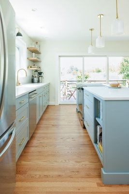 Chic Kitchen Remodel - This remodel was fun! We revived the floors and completely gutted the kitchen. The results are stunning!