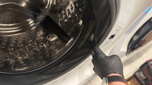 Whirlpool washer - The customer is front-load washer had a broken suspension spring, which caused the drum to drop and tear the door boot. We replaced the damaged spring and installed a brand new door boot. The washer was fully reassembled, tested, and now works like new. Fast repair and a happy customer! Whirlpool washer - The customer is front-load washer had a broken suspension spring, which caused the drum to drop and tear the door boot. We replaced the damaged spring and installed a brand new door boot. The washer was fully reassembled, tested, and now works like new. Fast repair and a happy customer!