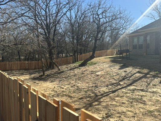 4 foot high custom Cedar shadow box fence with 3 custom gates - Customer requested a 4 foot high custom Cedar Shadow Box fence with 3 custom gates.  These are not panels they have been custom cut and placed on metals poles per customers request.