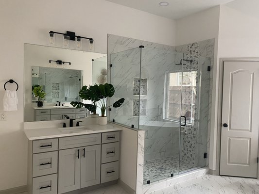 Bath Remodel - We added a glass shower and mirror to this bathroom remodel. Bath Remodel - We added a glass shower and mirror to this bathroom remodel.