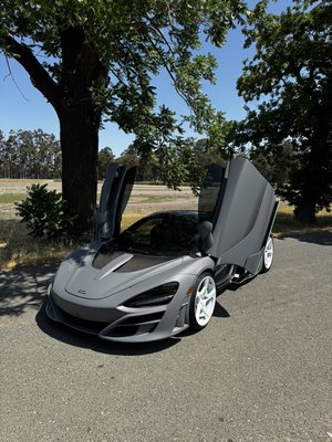 Exotic car wraps - 2022 mclaren came in for a full wrap job customer wanted matte dark grey wrap along with Tiffany blue calipers which we have painted also customer wanted Tiffany blue accents all around. 

Give us a call for quotes 510-598-8149