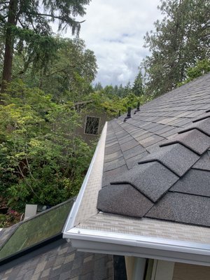Black Sable Designer Roof & Gutter Upgrade – Eugene, OR - This Eugene home received a full exterior upgrade with a complete roof replacement, new seamless gutters, and premium gutter protection.
We installed Owens Corning Duration Designer shingles in Black Sable, giving the home a bold, high‑contrast architectural look. For underlayment, we used OC ProArmor synthetic, providing durable, long‑lasting moisture protection.
To complete the project, we replaced the existing gutters with new 5K seamless aluminum gutters in low‑gloss white, paired with reinforced gutter guards for year‑round debris control and improved drainage performance.
This project delivered a clean, modern aesthetic and a major boost in long‑term protection for the home. Black Sable Designer Roof & Gutter Upgrade – Eugene, OR - This Eugene home received a full exterior upgrade with a complete roof replacement, new seamless gutters, and premium gutter protection.
We installed Owens Corning Duration Designer shingles in Black Sable, giving the home a bold, high‑contrast architectural look. For underlayment, we used OC ProArmor synthetic, providing durable, long‑lasting moisture protection.
To complete the project, we replaced the existing gutters with new 5K seamless aluminum gutters in low‑gloss white, paired with reinforced gutter guards for year‑round debris control and improved drainage performance.
This project delivered a clean, modern aesthetic and a major boost in long‑term protection for the home.