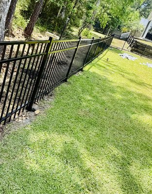 Little River Estates April 25 - Small 96 linear ft 3 rail, rake bottom, black aluminum fence with 1 gate access in April 2025 for a couple looking to create a secure area for their small dogs. Amazing customers to work with!! Needless to say, they were extremely satisfied with the install. 6 hour install time from digging the first hole to cementing the last picket! Little River Estates April 25 - Small 96 linear ft 3 rail, rake bottom, black aluminum fence with 1 gate access in April 2025 for a couple looking to create a secure area for their small dogs. Amazing customers to work with!! Needless to say, they were extremely satisfied with the install. 6 hour install time from digging the first hole to cementing the last picket!
