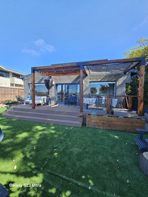Artificial Turf and Trex Decking - Building an acritical turf, decking and pavers to have their 2 girls enjoy the yard in those long and hot summer nights.