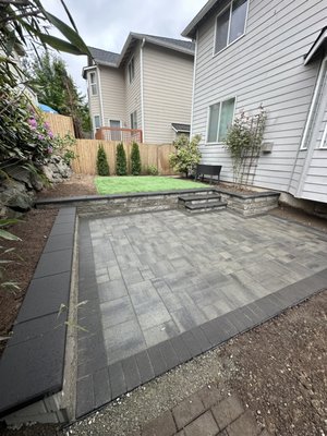 Backyard Remodel - This was a backyard makeover done recently. They now get to enjoy a nice turf area with a paver patio ready for summer!