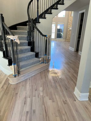 From Dark to Natural Color - This hardwood floor had a dark Royal Mahogany, new homeowner wanted a more modern and contemporary look so she contacted us and opted for a minimalist white washed look. So we setup samples for her to look at and honed in to a country white stain color, 2 coats of hardwood floor bleach and BONA Traffic HD Matte to get the color just right! From Dark to Natural Color - This hardwood floor had a dark Royal Mahogany, new homeowner wanted a more modern and contemporary look so she contacted us and opted for a minimalist white washed look. So we setup samples for her to look at and honed in to a country white stain color, 2 coats of hardwood floor bleach and BONA Traffic HD Matte to get the color just right!
