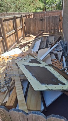 Construction debris before and after pictures. - Got a call for some construction debris left over from a home project. Made sure to get it done in a timely manner and we’ll always make sure the area is nice and clean when we are done!