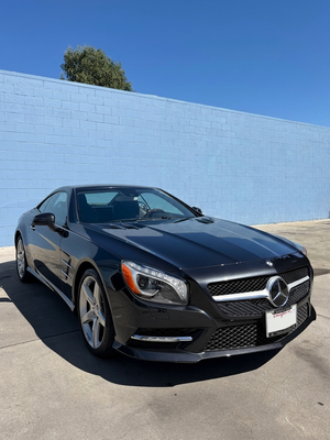 Bumper Repair - Mercedes-Benz SL550 - This Mercedes SL550 came in after a minor accident left the front bumper torn off. We restored it to factory condition using genuine OEM parts and achieved a seamless, factory-quality color match. Bumper Repair - Mercedes-Benz SL550 - This Mercedes SL550 came in after a minor accident left the front bumper torn off. We restored it to factory condition using genuine OEM parts and achieved a seamless, factory-quality color match.