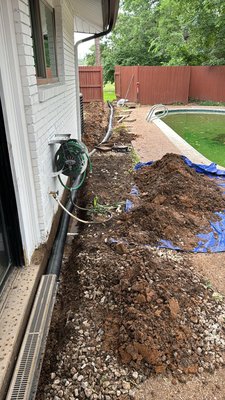 French Drain - Welcome to our French Drain service page! French drains are a crucial component of any property’s drainage system, effectively diverting water away from structures and preventing water damage. Our expert team specializes in designing and installing French drains tailored to your specific needs. With true commitment to quality, we ensure that your property remains protected from excess moisture. Contact our team this instant to learn more about our French Drain services and how we can safeguard your property.