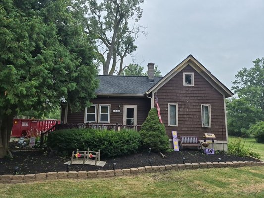 Late 19th Century Cedar Shake Tear Off - This Roof Replacement was on a late 19th Century Home. It had the original Cedar Shakes under 3 Layers of Asphalt to Start.