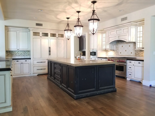 Engineered Hardwood Floors - Engineered hardwood floors can have the same appearance as a solid hardwood floor.
On an engineered hardwood flooring plank the top layer (wear layer) is usually solid hardwood but much thinner than a solid plank of hardwood flooring. The installation of engineered wood floors is much faster than a solid hardwood floor but it can not be refinished as often, if at all. Most engineered products are pre–finished, which saves time on site as well.
Pros:
Time. It takes half the time to arrive at a finished product in comparison to a solid unfinished installation.
Thickness. Engineered wood floors can be as thin as 3/8” and can go up to ¾”. This allows for flush transitions to another flooring in the home when remodeling.
Price. Engineered wood floors can be more affordable than a solid wood floor.
GETTING STARTED IS EASY… SIMPLY CONTACT US FOR A FREE CONSULTATION. Engineered Hardwood Floors - Engineered hardwood floors can have the same appearance as a solid hardwood floor.
On an engineered hardwood flooring plank the top layer (wear layer) is usually solid hardwood but much thinner than a solid plank of hardwood flooring. The installation of engineered wood floors is much faster than a solid hardwood floor but it can not be refinished as often, if at all. Most engineered products are pre–finished, which saves time on site as well.
Pros:
Time. It takes half the time to arrive at a finished product in comparison to a solid unfinished installation.
Thickness. Engineered wood floors can be as thin as 3/8” and can go up to ¾”. This allows for flush transitions to another flooring in the home when remodeling.
Price. Engineered wood floors can be more affordable than a solid wood floor.
GETTING STARTED IS EASY… SIMPLY CONTACT US FOR A FREE CONSULTATION.
