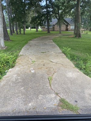 Driveway and culvert replacement - This was a circle driveway showing serious damages on both approaches, work consisted on breaking old concrete, replacing culverts, removing tree roots preventing future cracks and pouring the new driveways.