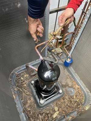 We replaced a compressor that had failed in this condenser.  AC is providing cool air once again! - The refrigerant compressor had failed in this unit we were called out to service.  Our team quickly ordered the replacement compressor and got to work replacing the failed component. Cool and comfortable air in our customer’s home has been restored!