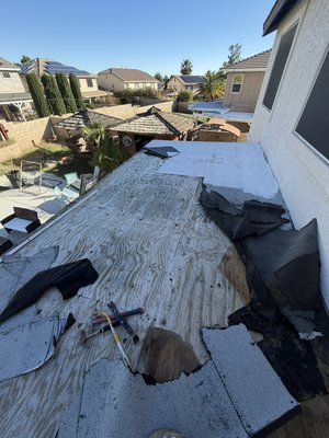 Torche down roof patio - This  patio roofing was damaged an was pealing out customer requested for new touch down roofing to be installed our roofing crew came in an did an amazing job customer was very happy