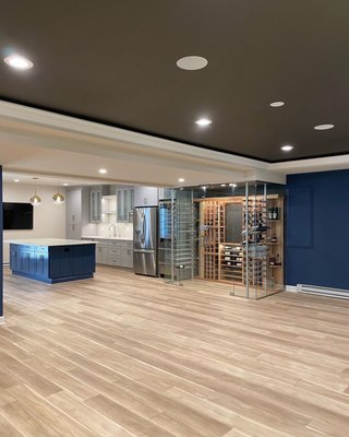 Basement in Ellicott City 2021 - Beautiful basement with custom built-ins, wet bar with wine cellar, open concept home theater, home gym and many updates