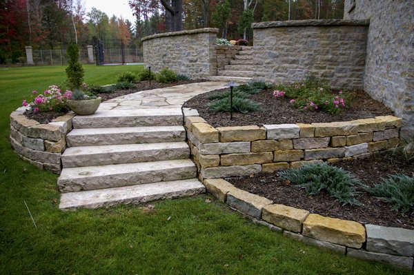 PATIOS & RETAINING WALLS - Walls can be made from many different materials–either natural stone or fabricated. They satisfy a variety of outdoor needs and can be both functional and decorative. Retaining walls come in a variety of sizes, shapes, and colors and can be installed in many different ways. Patios are a prime example of outdoor living space. When properly designed and constructed, they provide areas for dining, entertaining and relaxing. Landscape And Drainage Services creates an instant impression and adds to your property value. Create a showcase property that commands attention by completing the scene with distinctive plantings and landscape lighting. Our skilled craftsmen take great pride in building beautiful hardscapes that provide continuing enjoyment and lasting value.
List of other services: Sod, Sod Installation, Concrete, Concrete Installation, Bamboo Removal, Grading & Resloping, Erosion Control, Retaining Walls, Patios & Patio Installation PATIOS & RETAINING WALLS - Walls can be made from many different materials–either natural stone or fabricated. They satisfy a variety of outdoor needs and can be both functional and decorative. Retaining walls come in a variety of sizes, shapes, and colors and can be installed in many different ways. Patios are a prime example of outdoor living space. When properly designed and constructed, they provide areas for dining, entertaining and relaxing. Landscape And Drainage Services creates an instant impression and adds to your property value. Create a showcase property that commands attention by completing the scene with distinctive plantings and landscape lighting. Our skilled craftsmen take great pride in building beautiful hardscapes that provide continuing enjoyment and lasting value.
List of other services: Sod, Sod Installation, Concrete, Concrete Installation, Bamboo Removal, Grading & Resloping, Erosion Control, Retaining Walls, Patios & Patio Installation