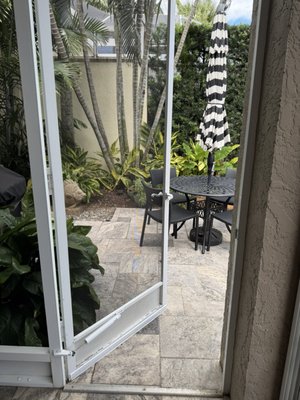 Patio Screen and Storm Doors - We got a service request for a screen door that presents multiple issues:

We replaced the weather stripping. We replaced it with the correct type and adhered it along the edges of the door frame.

Additionally, we replace the bottom sweep, which is a rubber or vinyl strip that seals the gap between the door and the threshold. We replaced it, removed the old sweep, measured the new one to ensure a proper fit, and attached it to the bottom of the door.

Other important parts that we replaced include the handle, the replaced Door Closer, and the support bracket

To maintain your screen and storm doors, we recommend cleaning the mesh and tracks monthly with mild soap and water, keeping them dry and free of debris. Inspect for damage annually or after bad weather, and lubricate hinges with dry silicone or graphite spray. Ensure weatherstripping is clean and intact for a good seal. These steps will help extend the life of your doors!