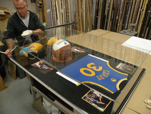 Stephen Curry - At Artistic Picture Framing, we’re all about honoring the legends of sports, and Stephen Curry is definitely one of them! His skill on the court and his effortless style off it have inspired countless fans. That’s why we’ve created unique custom frames that bring his most iconic moments to life Stephen Curry - At Artistic Picture Framing, we’re all about honoring the legends of sports, and Stephen Curry is definitely one of them! His skill on the court and his effortless style off it have inspired countless fans. That’s why we’ve created unique custom frames that bring his most iconic moments to life