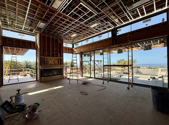 Malibu Home - This home was built earlier this year, and we assisted with all the glass work. We installed several types of windows and doors. The doors were all custom; this included pivot doors and sliding glass doors with a pocket door system and a motorized system. Malibu Home - This home was built earlier this year, and we assisted with all the glass work. We installed several types of windows and doors. The doors were all custom; this included pivot doors and sliding glass doors with a pocket door system and a motorized system.