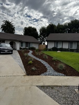 California Native, Drought Tolerant Landscape - We transformed this front yard into a beautiful, low-maintenance, drought-tolerant landscape. The project included lawn removal, leveling, installation of a new drip-irrigation system, professional-grade landscape fabric, drought-resistant plants, and a decorative rock river feature. Finished with premium mulch for a clean, natural look and long-term weed control — designed to save water while enhancing curb appeal.