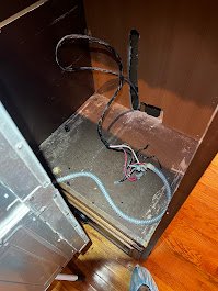 Issues with ( in wall oven ) - Customer was having issues with oven sporadically powering off while in use. removed oven from cabinet and revealed a terrible open splice in the wall. Presented customer options to correct the dangerous issue. Installed a j-box and proper connections per code.