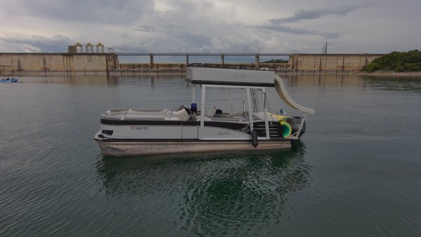 25’ Avalon Funship! - We just got a brand new boat for the 2021 boating season! Introducing our new 25’ Avalon Funship party barge! With a passenger capacity of 11 total, there’s plenty of room for your family & friends. This boat is gonna be the main attraction on the water with the awesome sound system and water slide!