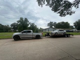 Hauling Metal - BMW that sits low to the ground, doesn't run, NO PROBLEM! The 13,500lb winch and 5 ft ramps combined with a 2 ft dovetail pulled the car on the trailer with zero effort. Loaded and strapped in 15 minutes! Easy work for Tina the Trailer! Hauling Metal - BMW that sits low to the ground, doesn't run, NO PROBLEM! The 13,500lb winch and 5 ft ramps combined with a 2 ft dovetail pulled the car on the trailer with zero effort. Loaded and strapped in 15 minutes! Easy work for Tina the Trailer!