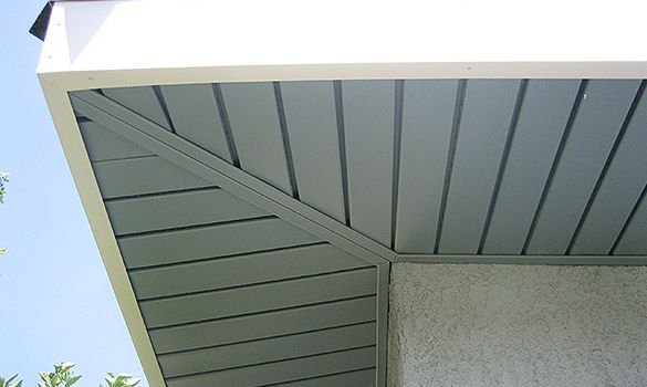 Soffit & Fascia Cover - LI Metal Systems offers a wide-range of beautiful and durable aluminum soffit and fascia cover options for your home. These easy-care products offer both ventilation and protection as well as providing a polished home exterior look

An added benefit of soffit and fascia cover is that they help protect the exterior of your home, along with offering a disguise for attic ventilation. They also help to keep pests out such as squirrels, rats, bats and birds.

Our aluminum soffit and fascia cover overhang enclosures are designed to complement your home’s exterior, while protecting your investment.