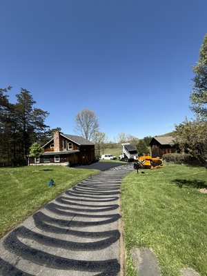 New asphalt - This was a new over lay of hot asphalt with a layer of tac coat to bond new asphalt to old asphalt. New asphalt - This was a new over lay of hot asphalt with a layer of tac coat to bond new asphalt to old asphalt.