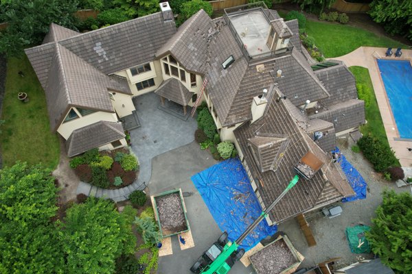 Roof Replacement - This beautiful project was done in Sammamish, WA. GAF Grand Canyon with 50 years warranty backed by roofing manufacturer. Roof Replacement - This beautiful project was done in Sammamish, WA. GAF Grand Canyon with 50 years warranty backed by roofing manufacturer.