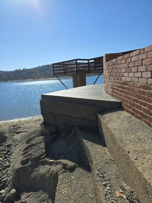 Dock Repair - 10in Concrete slab with 2ftx2ft+ footing was required to repair the sever damage the lake had made to a side walk with no reinforcement Dock Repair - 10in Concrete slab with 2ftx2ft+ footing was required to repair the sever damage the lake had made to a side walk with no reinforcement
