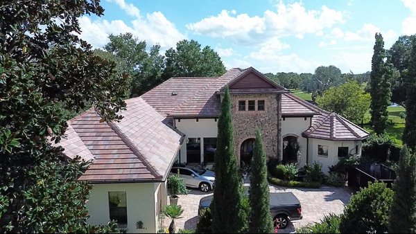 Luxurious Golf Course Tile Reroof - Transform your home in Orlando, FL with a luxurious golf course tile reroof designed for elegance and durability. This project features a premium tile roof replacement that enhances curb appeal while providing long-lasting protection against Florida’s harsh weather conditions. Luxurious Golf Course Tile Reroof - Transform your home in Orlando, FL with a luxurious golf course tile reroof designed for elegance and durability. This project features a premium tile roof replacement that enhances curb appeal while providing long-lasting protection against Florida’s harsh weather conditions.