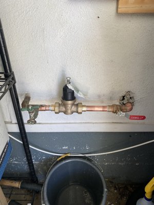 pressure regulator replacement - We replaced an old, leaking pressure regulator that had excessive and unnecessary piping. The previous setup was overcomplicated, so we simplified the layout by running the new regulator straight across and using less copper, resulting in a cleaner, more efficient, and visually streamlined installation. pressure regulator replacement - We replaced an old, leaking pressure regulator that had excessive and unnecessary piping. The previous setup was overcomplicated, so we simplified the layout by running the new regulator straight across and using less copper, resulting in a cleaner, more efficient, and visually streamlined installation.