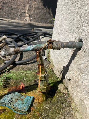 Fixed a crooked and leaking point of connection - This customer has a crooked and leaking galvanized water pipe heading into the asphalt feeding their back unit. Another plumber had told them they would have to rip up the asphalt across the entire driveway to get the leak repaired. We were able to get the leak repaired without having to touch the asphalt at all to allow the customer more time to save up to replace the entire line. We added a new ball valve to isolate the back unit and a new hose bib. Another happy Customer! Fixed a crooked and leaking point of connection - This customer has a crooked and leaking galvanized water pipe heading into the asphalt feeding their back unit. Another plumber had told them they would have to rip up the asphalt across the entire driveway to get the leak repaired. We were able to get the leak repaired without having to touch the asphalt at all to allow the customer more time to save up to replace the entire line. We added a new ball valve to isolate the back unit and a new hose bib. Another happy Customer!