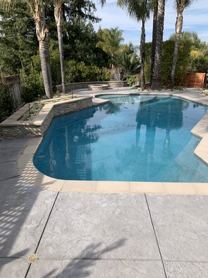 Baldwin backyard - Backyard make over, new stamped concrete, coping, pebble tech, natural stone wall. Baldwin backyard - Backyard make over, new stamped concrete, coping, pebble tech, natural stone wall.