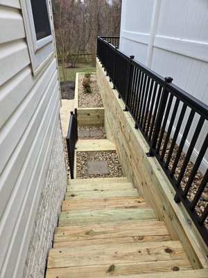 2024 retaining wall re-build - this retaining wall was rotted and in need of tlc we tore down the entire wall and steps and re-built with new lumber and brought the rails back to life 2024 retaining wall re-build - this retaining wall was rotted and in need of tlc we tore down the entire wall and steps and re-built with new lumber and brought the rails back to life