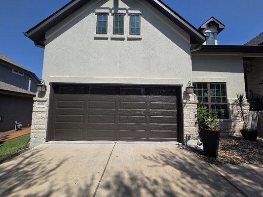 Steel-backing Insulated Garage Door Replacement - This project involved replacing a standard builder-grade garage door with a high-quality, insulated steel-back garage door. The existing door, typical of new construction, lacked durability, energy efficiency, and noise reduction. Our team carefully removed the old door, ensuring no damage to the surrounding structure, and prepared the opening for the new installation.
The new garage door features a robust steel backing with insulation, improving thermal performance and helping maintain interior temperatures, reducing energy costs. Its durable construction offers enhanced security and longevity compared to the original builder-grade door. The insulated core also minimizes noise from both outside and inside the garage, providing a quieter, more comfortable environment.
Installation included precise alignment, calibration of the door’s springs and hardware, and integration with the existing garage door opener. All components were tested for smooth, reliable operation, ensuring safety and performance standards were met. The final result is a modern, functional, and aesthetically pleasing garage door that elevates both the appearance and value of the home. Steel-backing Insulated Garage Door Replacement - This project involved replacing a standard builder-grade garage door with a high-quality, insulated steel-back garage door. The existing door, typical of new construction, lacked durability, energy efficiency, and noise reduction. Our team carefully removed the old door, ensuring no damage to the surrounding structure, and prepared the opening for the new installation.
The new garage door features a robust steel backing with insulation, improving thermal performance and helping maintain interior temperatures, reducing energy costs. Its durable construction offers enhanced security and longevity compared to the original builder-grade door. The insulated core also minimizes noise from both outside and inside the garage, providing a quieter, more comfortable environment.
Installation included precise alignment, calibration of the door’s springs and hardware, and integration with the existing garage door opener. All components were tested for smooth, reliable operation, ensuring safety and performance standards were met. The final result is a modern, functional, and aesthetically pleasing garage door that elevates both the appearance and value of the home.