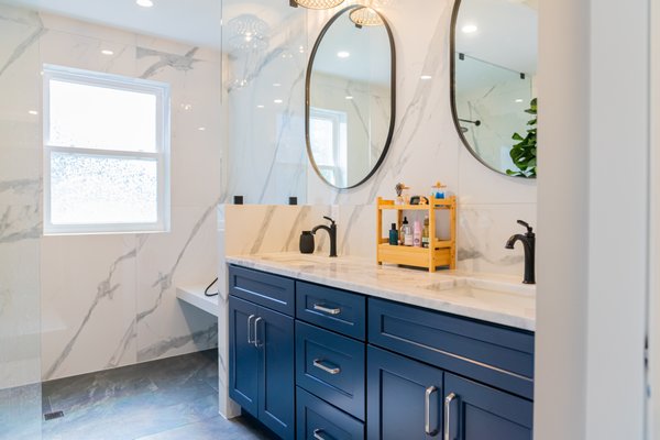 Spa-inspired bathroom remodel - This is a spa-inspired bathroom remodeling project completed in Grafton, MA.

Clean lines, custom cabinetry, elegant tile work, and a freestanding soaking tub transformed this space into a relaxing everyday retreat.