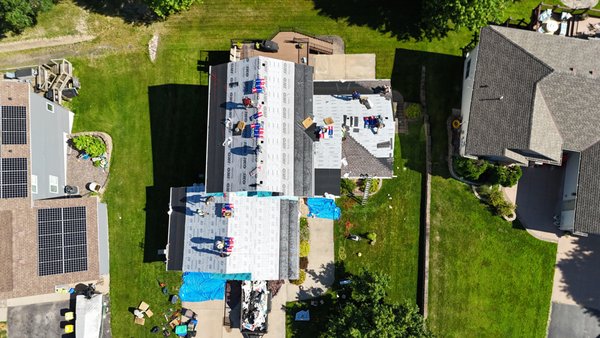 Roof replacement - Complete Storm Restoration & Roof Replacement
When severe weather hits, the damage isn't always just cosmetic—it’s a threat to your home's structural integrity. This gallery highlights a complete roof replacement for a home recently battered by severe hail and wind. Our goal was simple: strip away the damage, eliminate the stress, and build back a stunning, weather-resilient roofing system.

Project Highlights:

Comprehensive Tear-Off: We stripped the damaged roof down to the bare decking to ensure a solid, rot-free foundation before building back.

Premium Defense: Installed heavy-duty ice/water shields and high-impact architectural shingles engineered to withstand future storms.

Precision Details: Upgraded all ventilation, pipe boots, and custom flashing to guarantee a watertight seal where it matters most.

Spotless Cleanup: We protected the homeowner's landscaping from start to finish and completed the job with a rigorous magnetic sweep for stray nails.

The photos show more than just a massive upgrade in curb appeal—they represent a return to total peace of mind for these homeowners.

Think your roof might have hidden storm damage? Reach out today for a free, no-obligation inspection. We build roofs that weather the storm.
