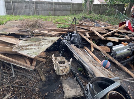 Garage clean out - This customer had a 24x24 garage that collapsed due to bad weather Garage clean out - This customer had a 24x24 garage that collapsed due to bad weather
