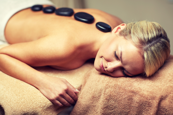 Hot Stone Massage - Stone therapy uses hot (or sometimes cold) stones to work deeper into the muscles without the discomfort of regular deep tissue massage to improve circulation, reduce inflammation and relax the muscles. Hot Stone Massage - Stone therapy uses hot (or sometimes cold) stones to work deeper into the muscles without the discomfort of regular deep tissue massage to improve circulation, reduce inflammation and relax the muscles.