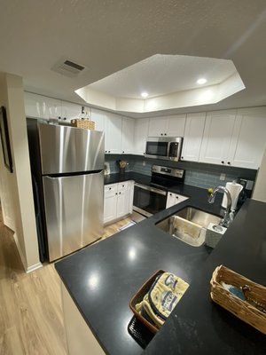 Complete condo remodel port charlotte 2021 - This is a complete condo kitchen remodel. We demolished the original kitchen and installed new everything from flooring through the entire home, new cabinets, countertops, backsplash, recess ceiling with lighting, appliances, fixtures etc. Complete condo remodel port charlotte 2021 - This is a complete condo kitchen remodel. We demolished the original kitchen and installed new everything from flooring through the entire home, new cabinets, countertops, backsplash, recess ceiling with lighting, appliances, fixtures etc.
