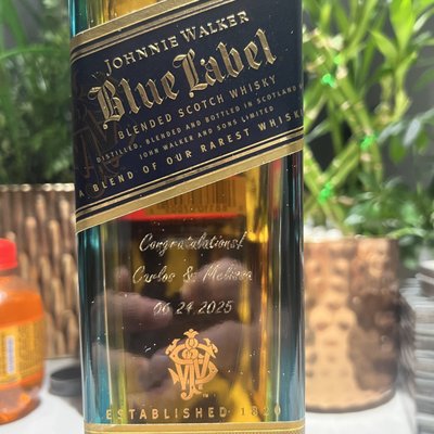 Glass Bottle Engraving - Stylizing bottles with a bespoke engraving. Give the ultimate experience and memories of that special moment with a customized bottle!