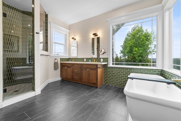 Del Mar Máster Bathroom Remodel - A perfect blend of luxury, comfort, and craftsmanship. This stunning master bathroom transformation features a spacious glass shower, elegant green tile accents, custom wood vanity, modern fixtures, and a relaxing freestanding soaking tub with a beautiful view. Del Mar Máster Bathroom Remodel - A perfect blend of luxury, comfort, and craftsmanship. This stunning master bathroom transformation features a spacious glass shower, elegant green tile accents, custom wood vanity, modern fixtures, and a relaxing freestanding soaking tub with a beautiful view.