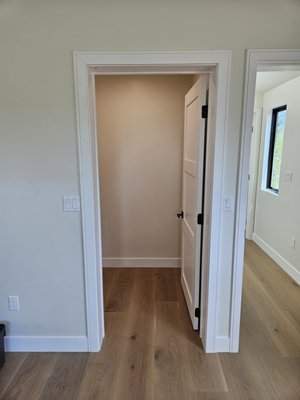 Shelf Closet Organizers - This client moved into a brand new home and needed to make her walk in closet her own.  I installed customized shelving that fit this specific space and turned out looking very high end and clean.